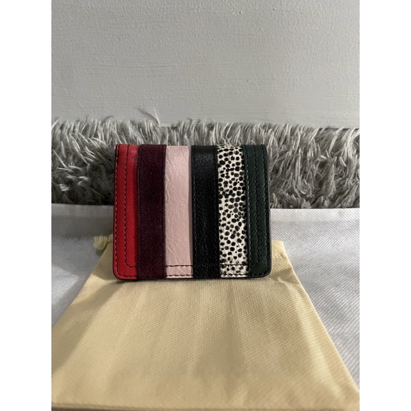 Dompet fossil small logan bifold black patchwork