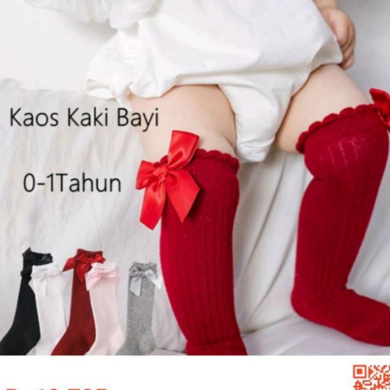 Kaus kaki panjang selutut dengan aksen pita,cocok untuk anak perempuan. Kaos kaki berbahan lembut