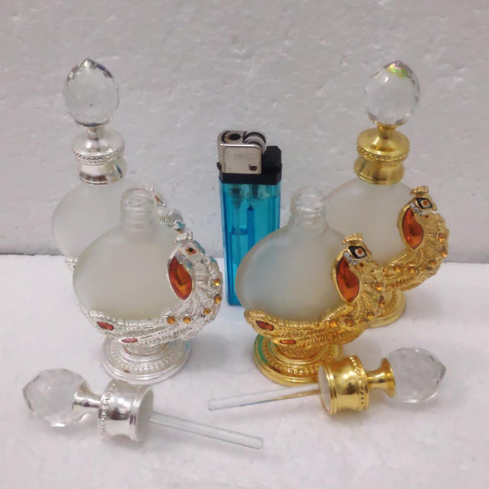botol antik 12 cc motif burung. harga per pcs. lidinya kaca R