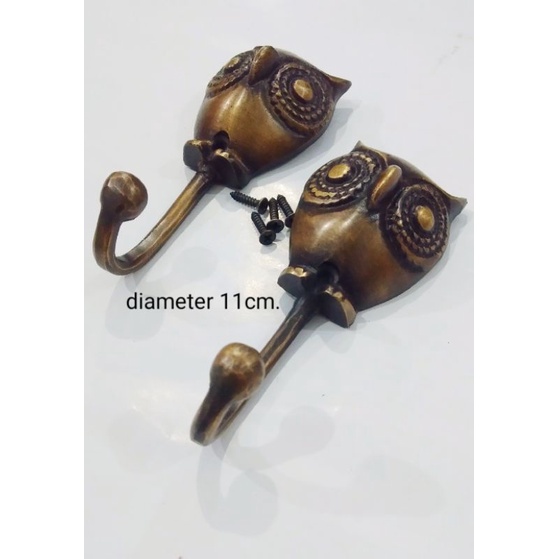 Gantungan baju motif burung antik diameter 11cm.