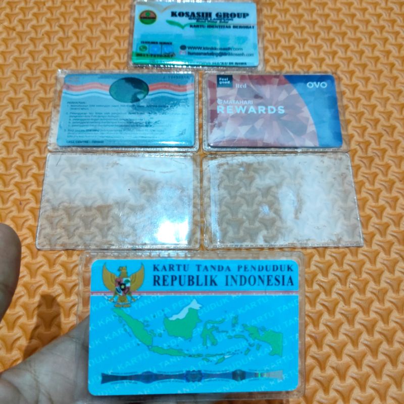 

Sampul bungkus cover plastik pelindung kartu kredit atm etoll flazz sertifikat ktp-bening bungkus