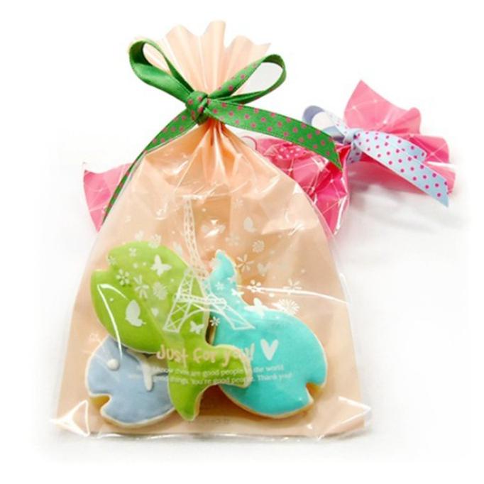 

PLASTIK BUNGKUS " motif " sovenir kado gift bag kantong opp