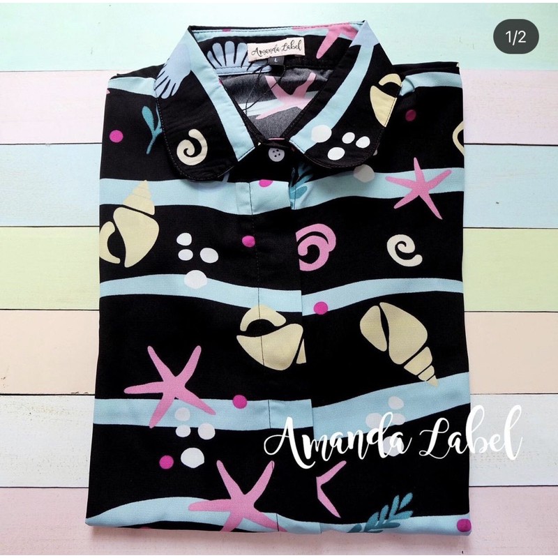 

Kemeja Tema Laut Amanda Label