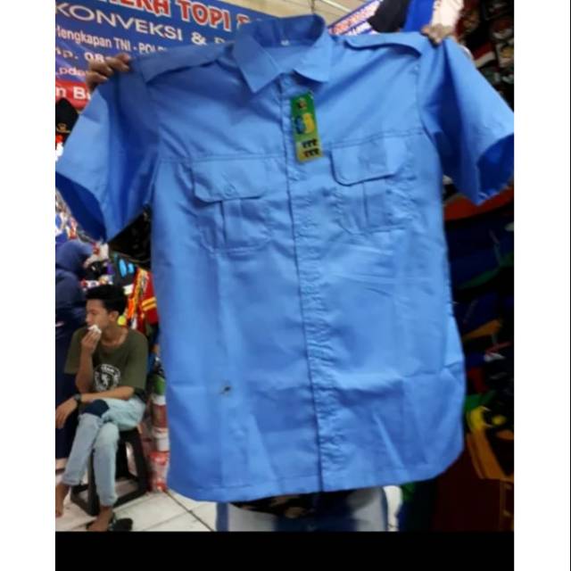 Kemeja Biru Warna Telor Asin