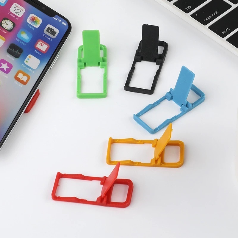 Bracket Lipat Mini Portable Bahan Plastik Warna-Warni Untuk Smartphone Universal