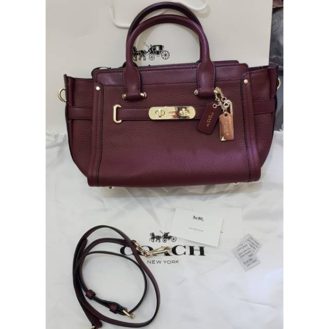 Preloved coach swagger 27 bergundy (mirror)