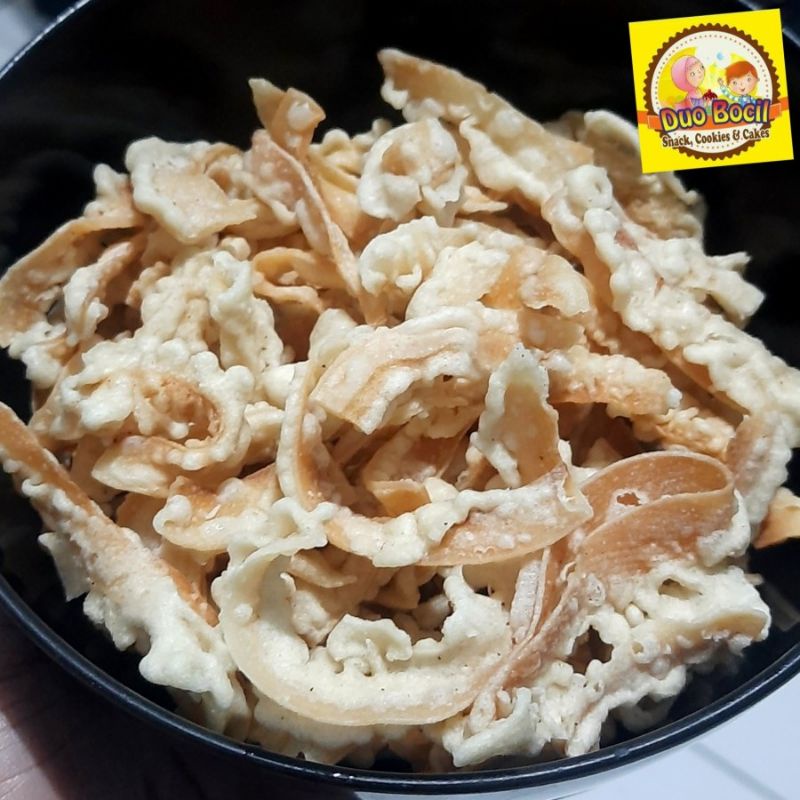 

Keripik Kelapa Muda Manis - Coconut Chips 250 Gram - Duo Bocil Snack