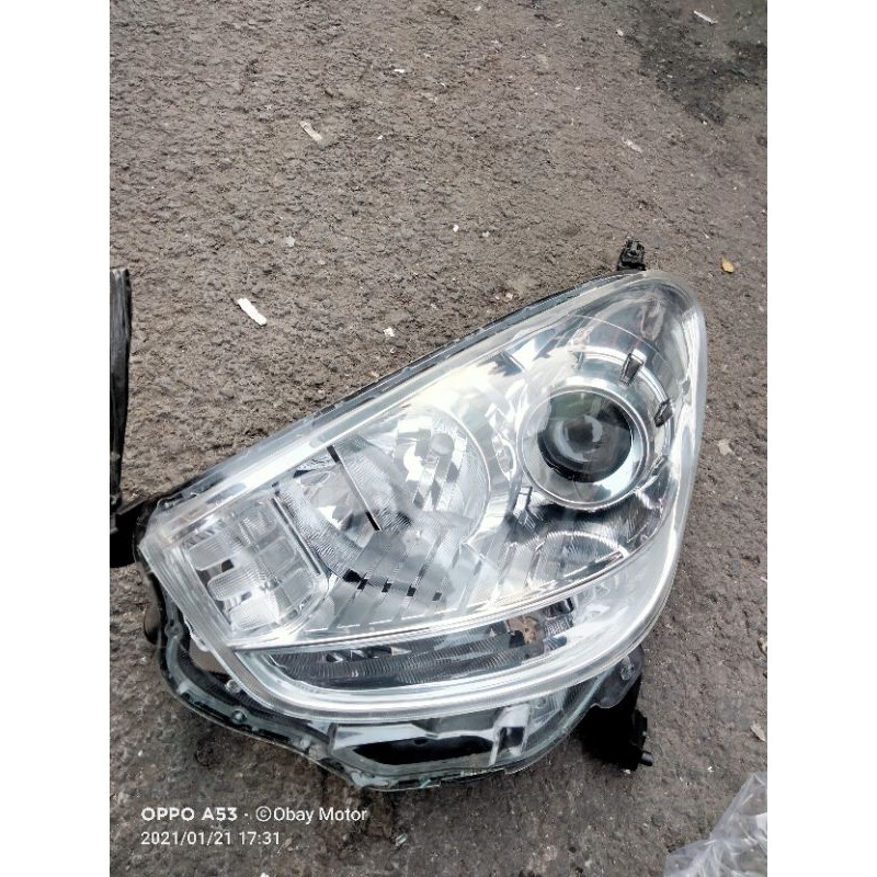 headlamp Daihatsu sirion 2012