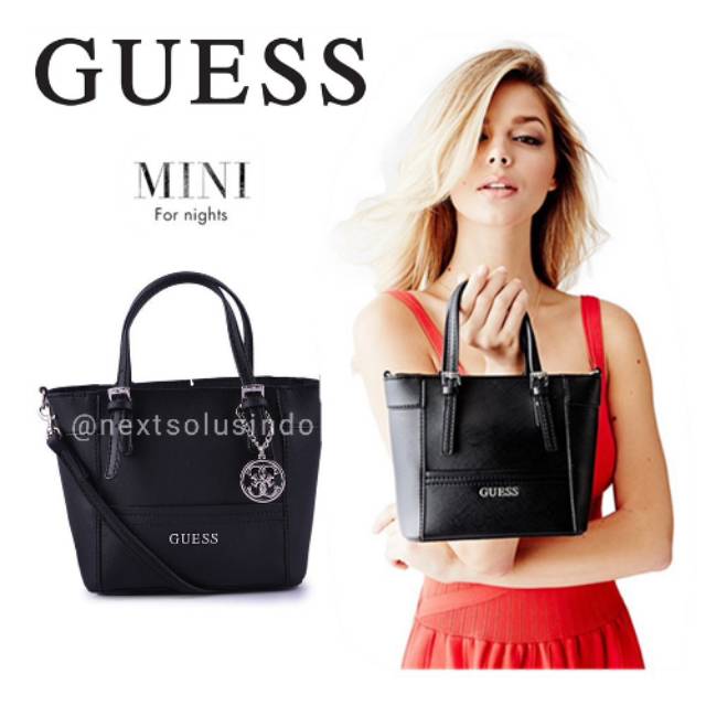 Tas Guess delaney mini clutch