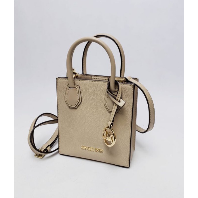 Michael Kors  mercer xs ns shopper xbody leather. Bisque.
