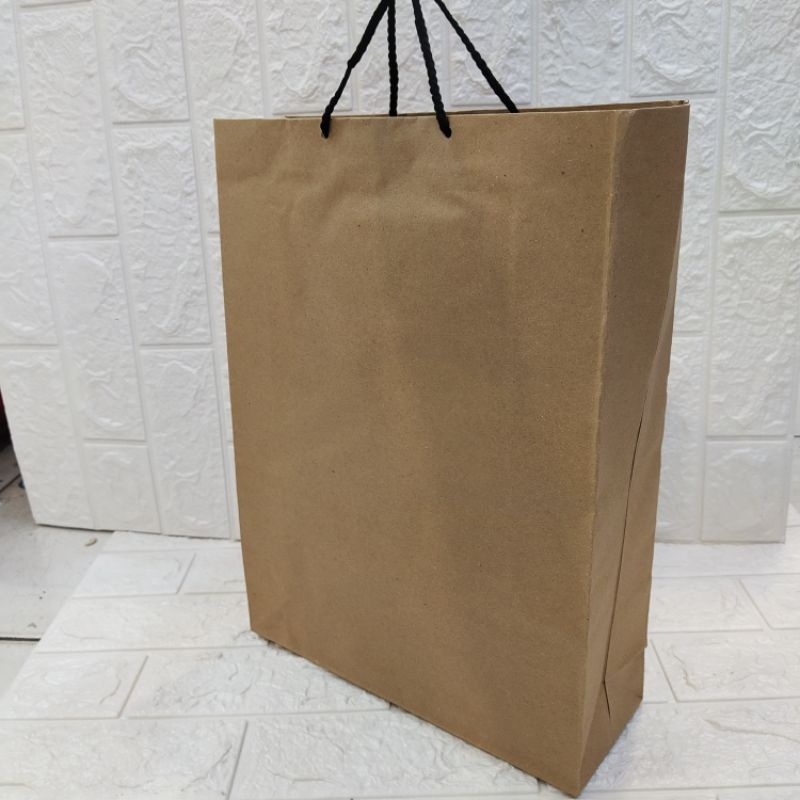 

paper bag polos/paper bag coklat ukuran 25x32x10cm 1pack isi 12pc