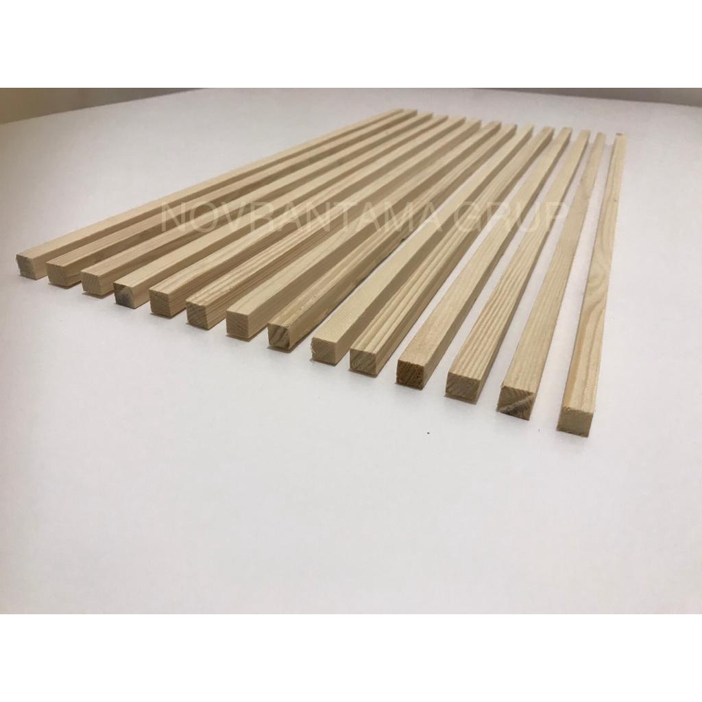 Lis kayu Jati Belanda 2x2 cm panjang 200cm
