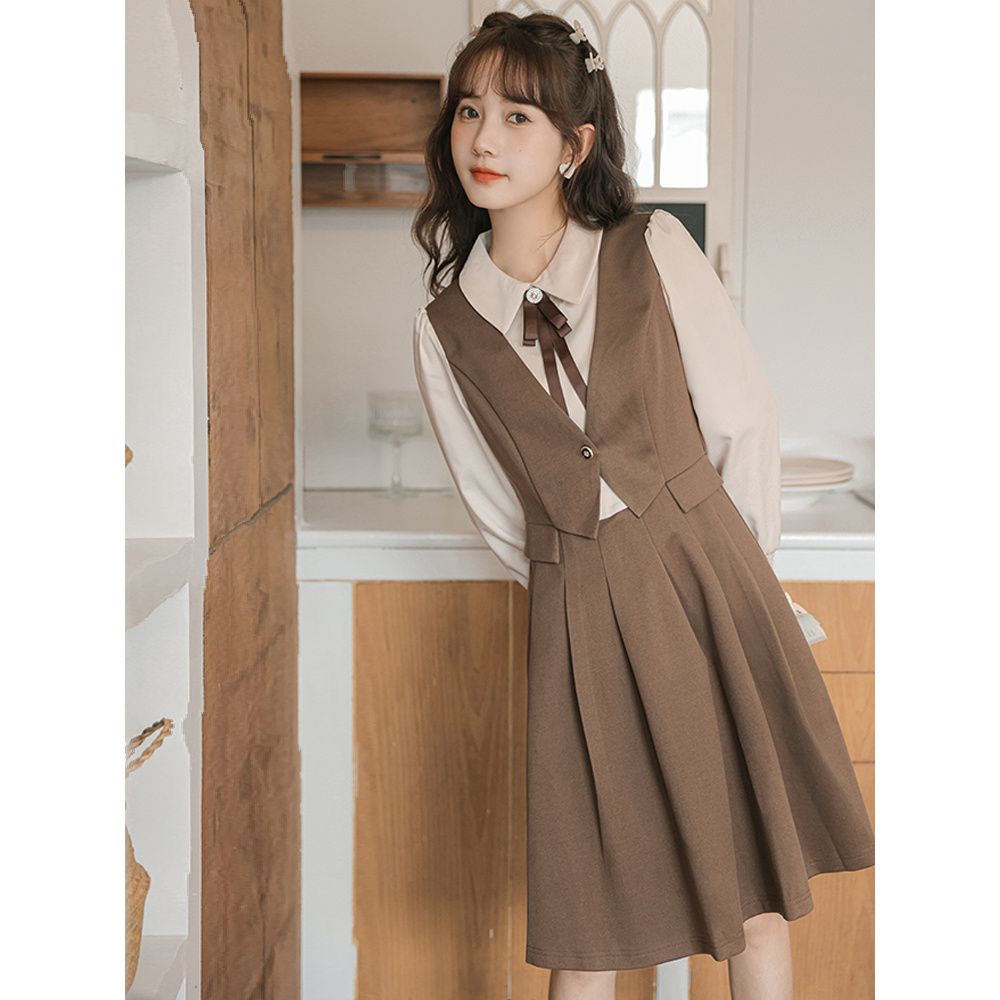 Angin lembut dan temperamen manis penyambungan gaun lipit dua potong palsu pinggang wanita rok A-line siswa ramping