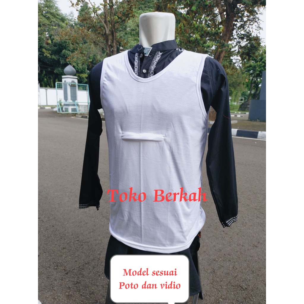Kaos dalam haji dan umroh peria saku doraemon