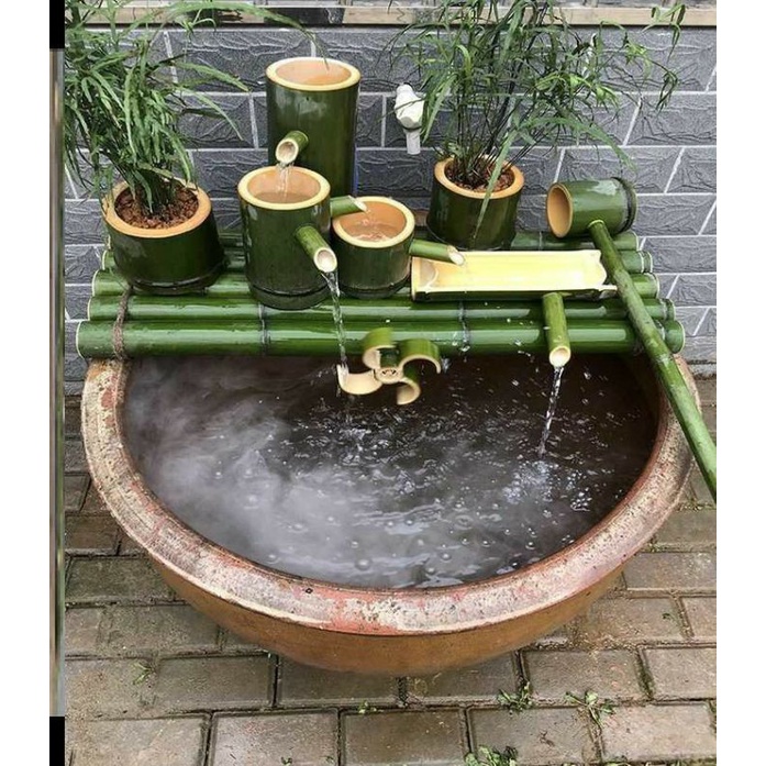 pancuran air dari bambu,pancuran bambu,air mancur bambu,pancuran kolam ikan hias,pancuran dekorasi a