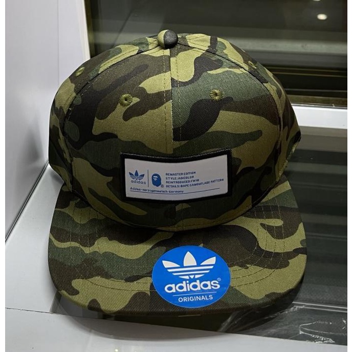 Topi snapback adidas camo