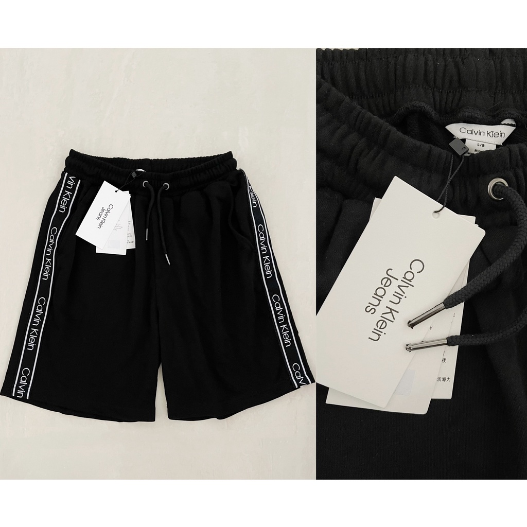 ClvKln logo tape drawstring short pants