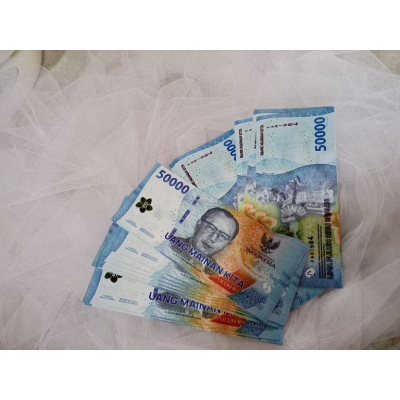 10 lembar uang mainan 50.000 emisi baru