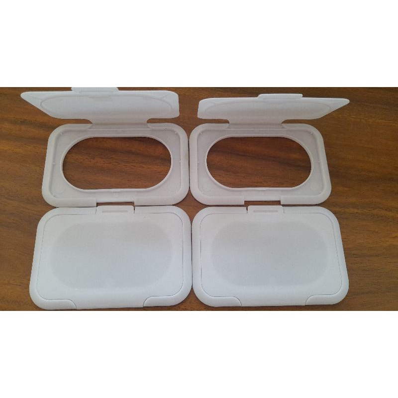 Tutup tissue basah flip top berikut perekat/lem..