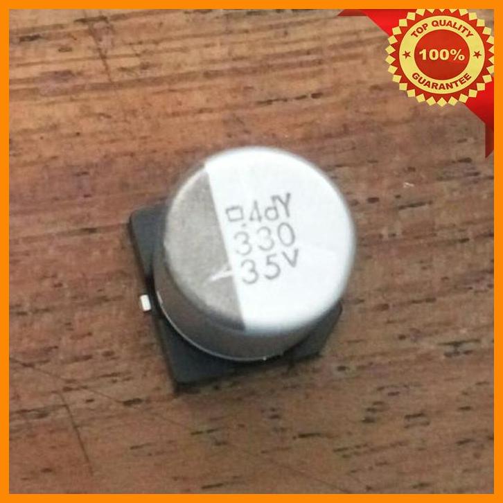 (J4C) kapasitor elco elko SMD 330uf / 35v nippon chemicon