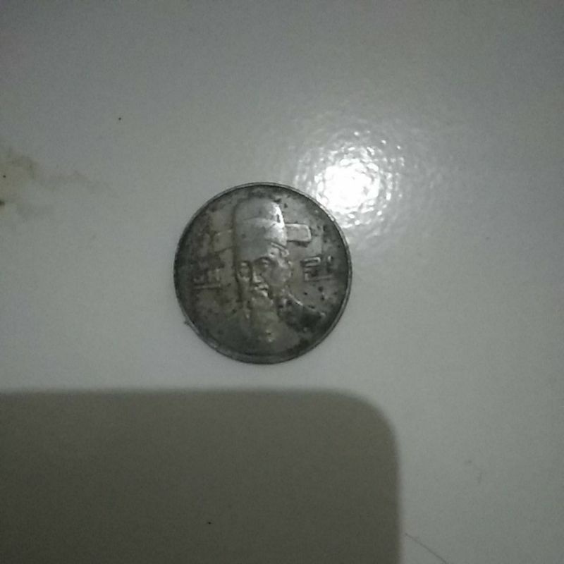 koin kuno cina 100 yen tahun 2000