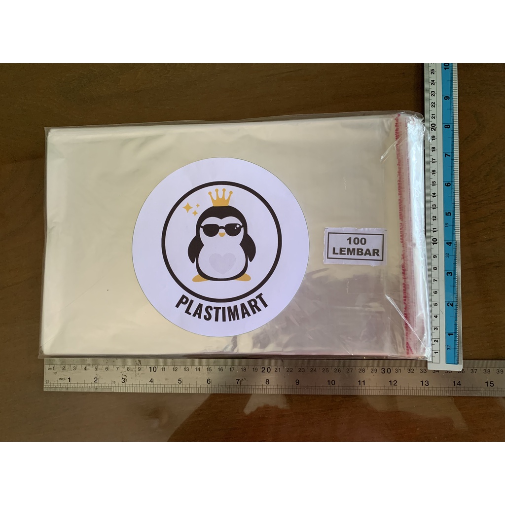 

Plastik OPP 20X30 Baju Jilbab Souvenir Undangan Berperekat 100 Lembar