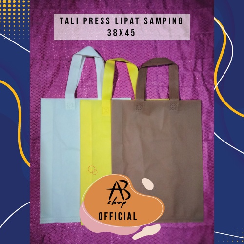 

Goodie Bag Tali Press Lipat Samping (uk.38x45) / Tas kain spunbond / Souvenir acara