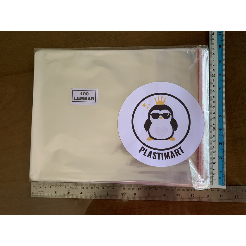 

Plastik OPP 25X30 Baju Jilbab Souvenir Undangan Berperekat 100 Lembar