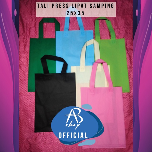 

Goodie Bag Tali Press Lipat Samping (uk.25x35) / Tas kain spunbond / Souvenir acara