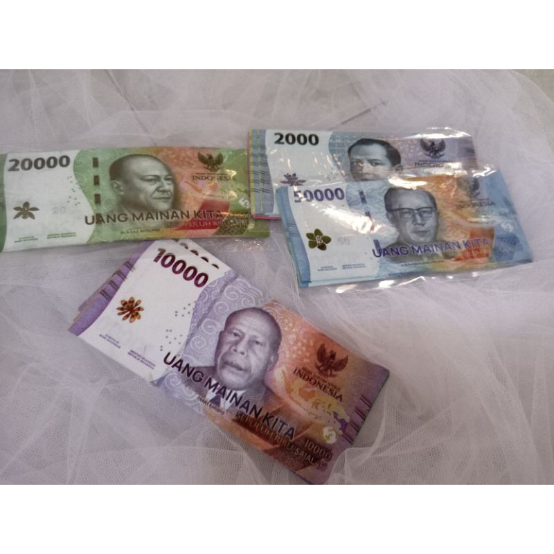 10 lembar uang mainan 10.000 emisi baru