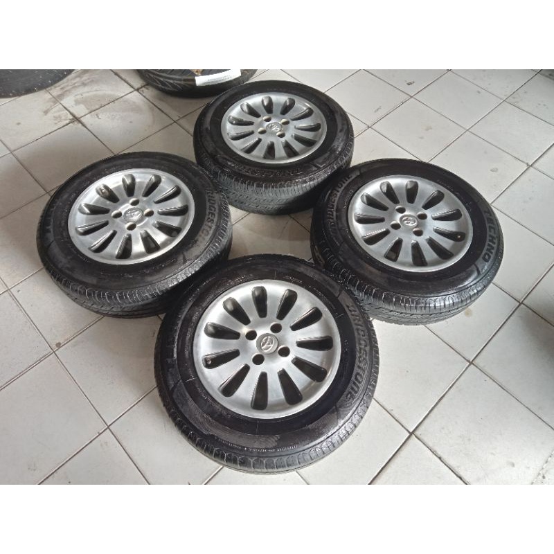 pelek Racing Toyota ring  14+ban 185 70 14 lebar 6 et 38 pcd 4x100