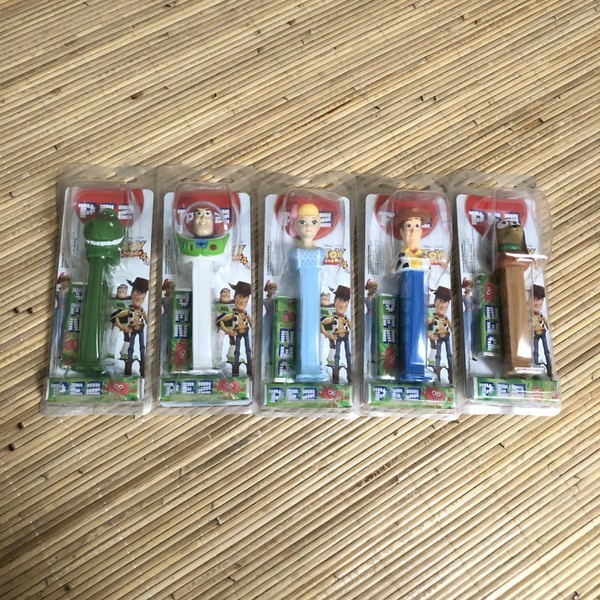 PEZ TOY STORY WOODY BUZZ LIGHTYEAR BO PEEP SLINKY CANDY DISPENSER
