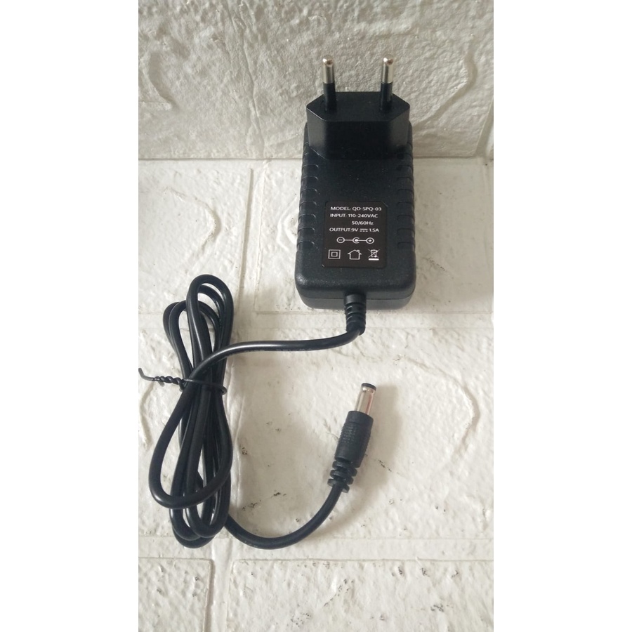 Adapter UNTUK speaker SIMBADDA Model QD SPQ 03 Input 110-240VAC 50/60Hz Output 9V 1.5A