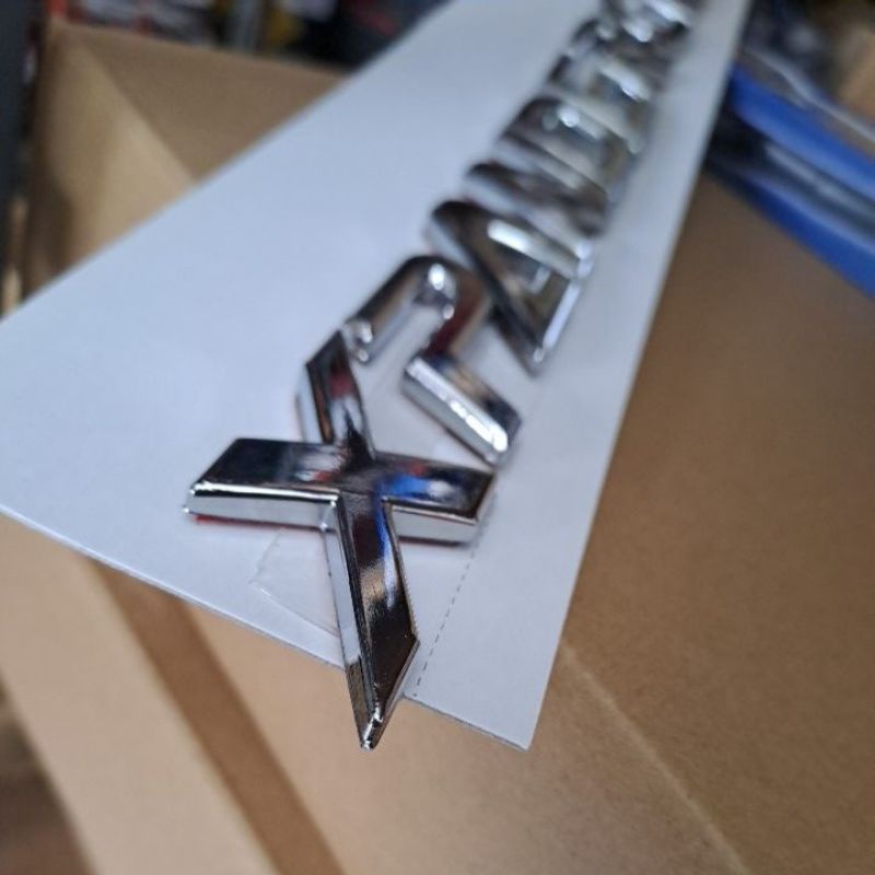 EMBLEM KAP MESIN XPANDER CROSS OEM KUALITY