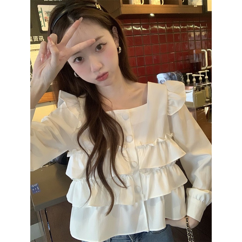 Atasan kerah persegi Prancis musim semi kemeja gaya asing baru