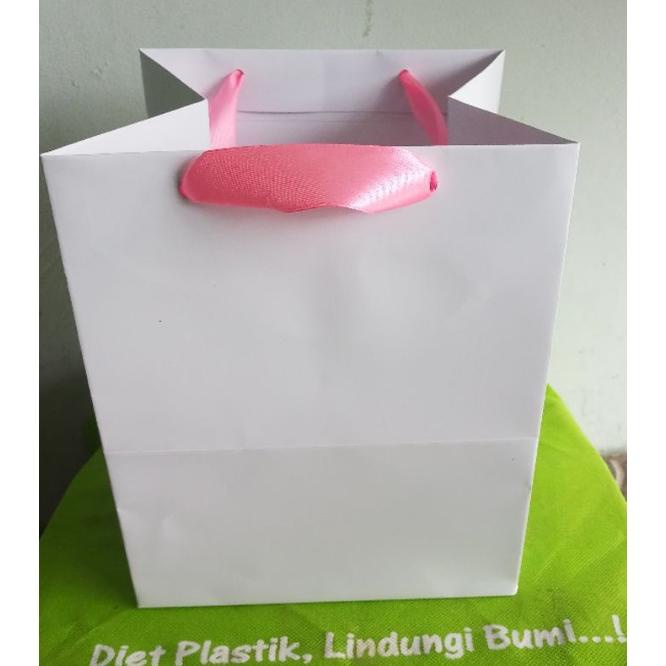 

PAPERBAG PUTIH UNTUK TOPLES KUE KERING 500GR, SIZE P17XL17XT20 .