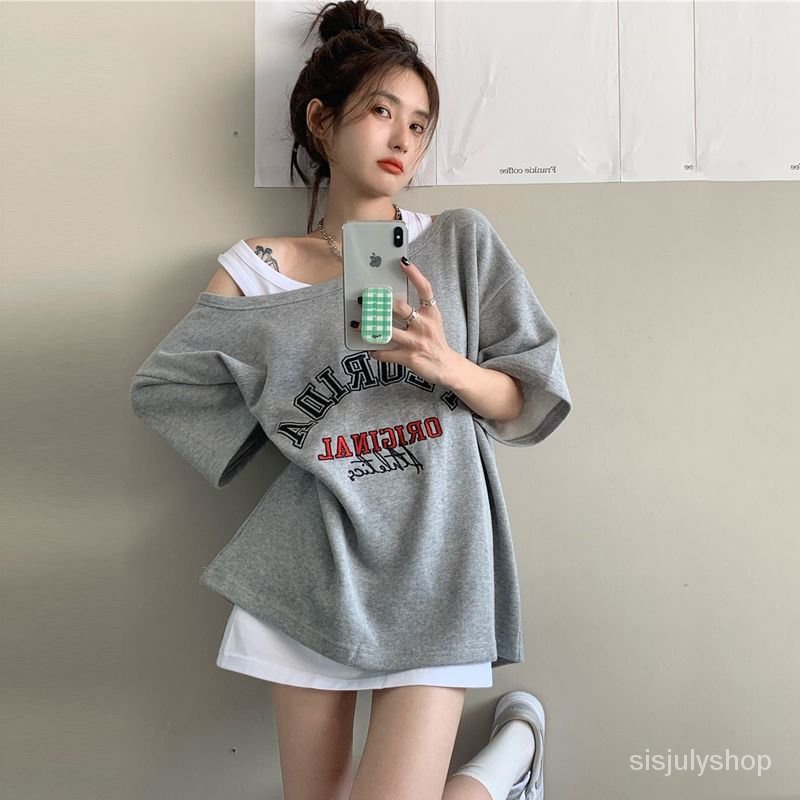 Kaos wanita longgar versi Korea dari bagian panjang atasan lengan pendek angin malas yang baru di pa