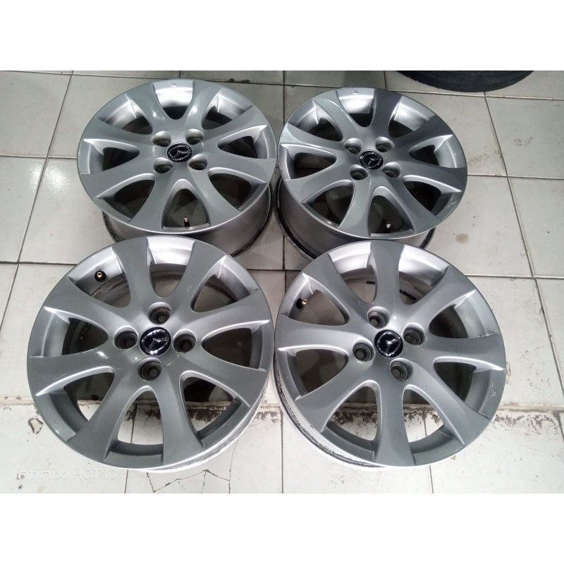 velg bekas mobil mazda ring 15 lebar 5,5 et 45 pcd 4x100