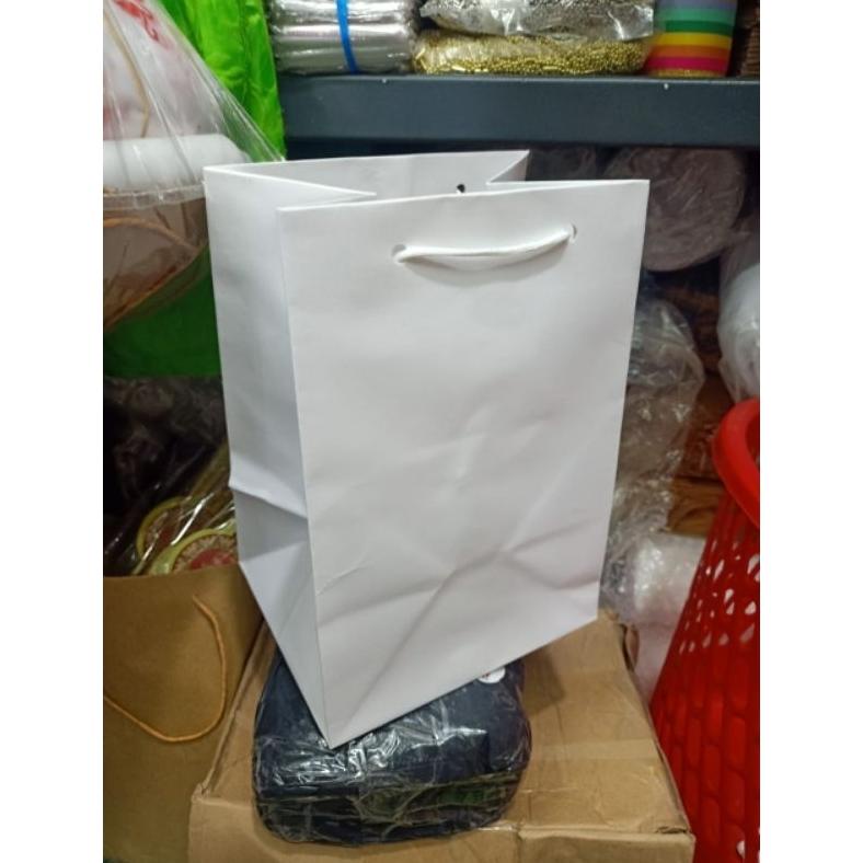

PAPER BAG BUAT TOPLES NEW PUTIH ISI 12 PCS TERLARIS DAN TERMURAH .
