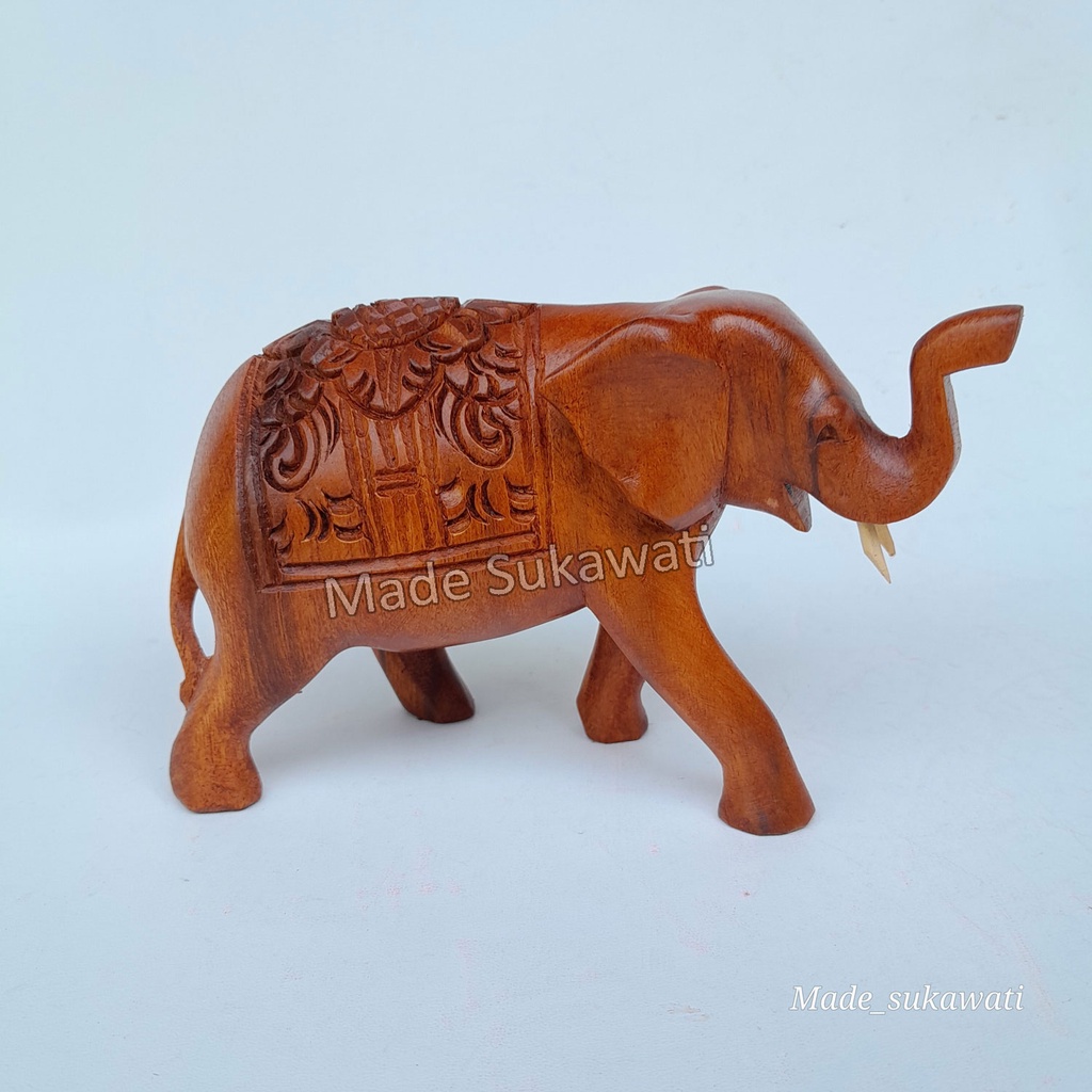 Kerajinan patung kayu gajah berjalan panjang 15cm tinggi 10cm ukiran handmade bali