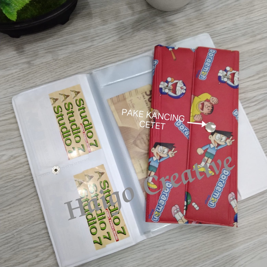 DOMPET DISIPLIN DORAEMON - PENUTUP PAKE KANCING CETET