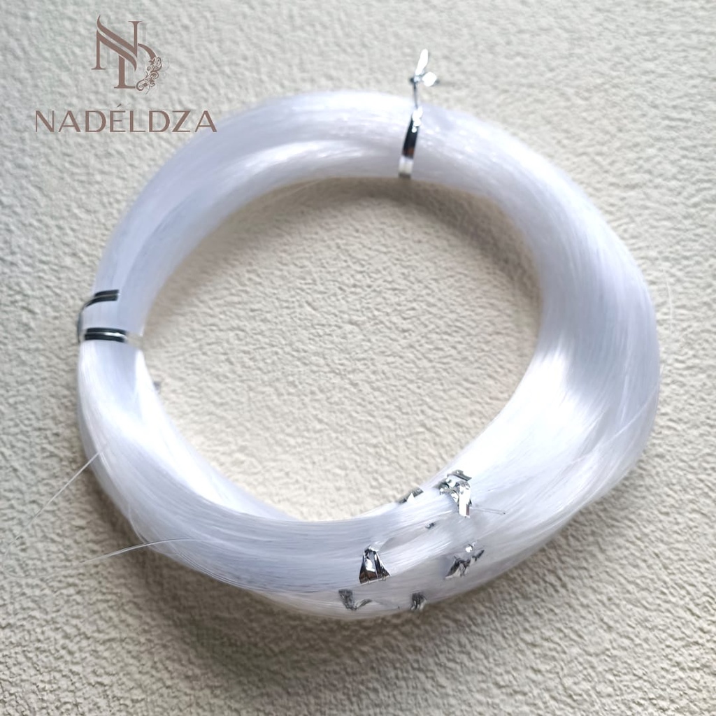 

AT Tali Senar Bening Non Elastis 0.4mm