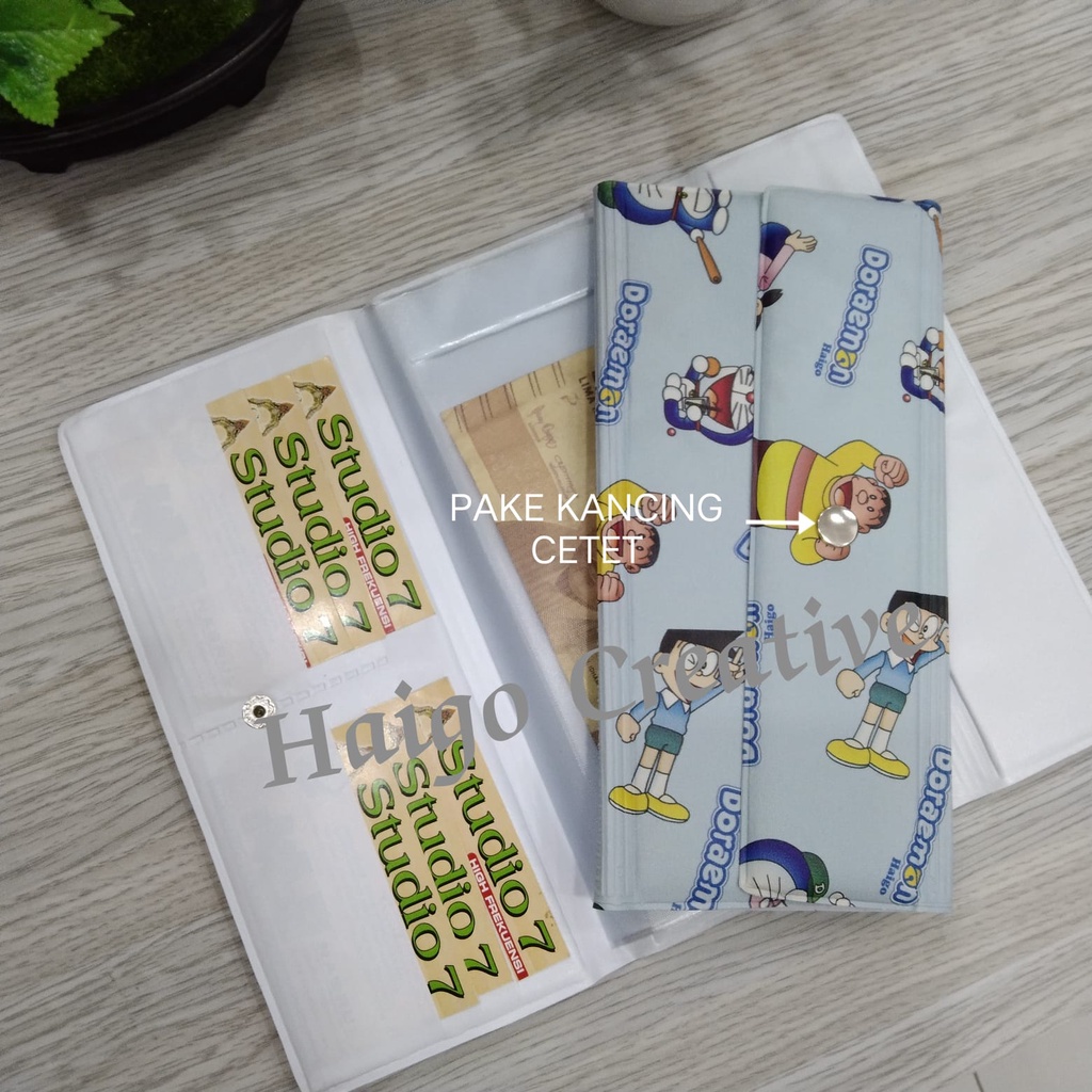 DOMPET DISIPLIN DORAEMON - PENUTUP PAKE KANCING CETET