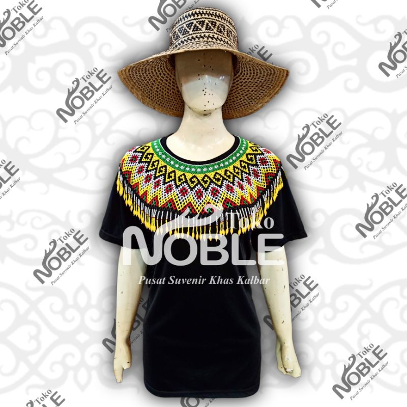 Teratai Manik Baju Adat Dayak