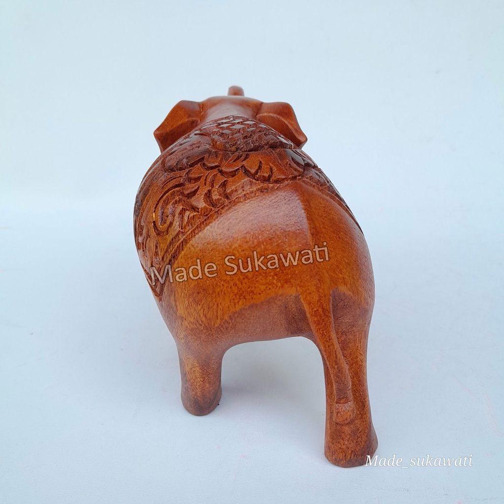 Kerajinan patung kayu gajah berjalan panjang 15cm tinggi 10cm ukiran handmade bali