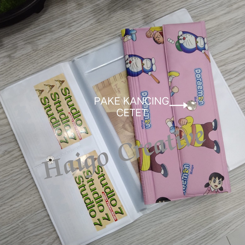 DOMPET DISIPLIN DORAEMON - PENUTUP PAKE KANCING CETET