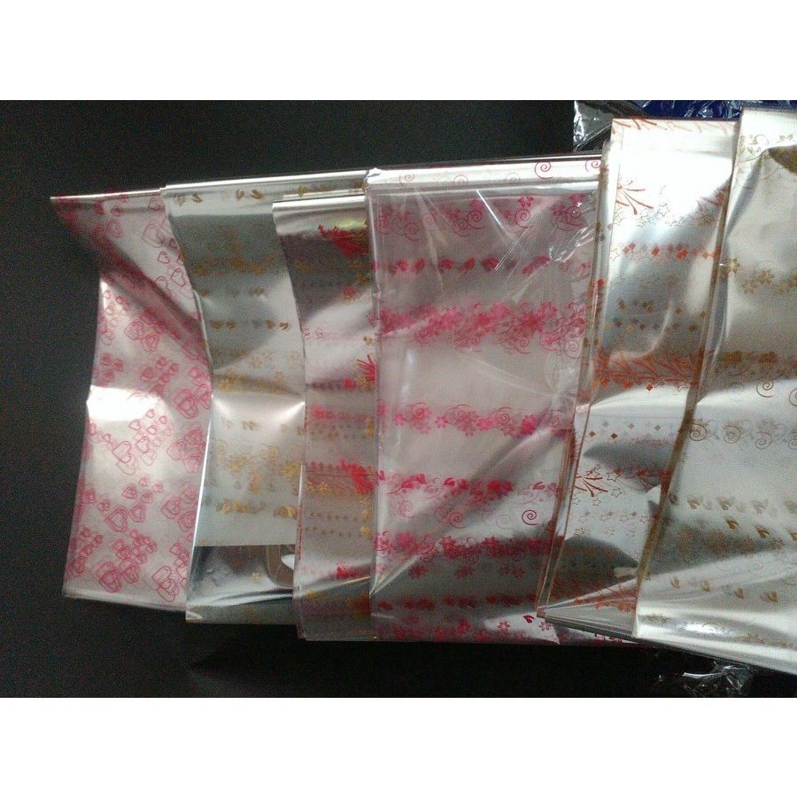 

Plastik Kado Kaca Bening Motif P:25