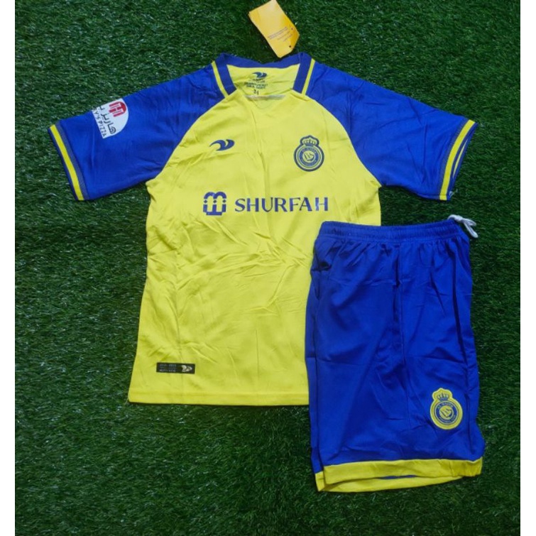 Setelan Jersey Bola Al Nassr  Anak Junior Home 2022 Grade Ori Import Baju Sepak Bola Anak