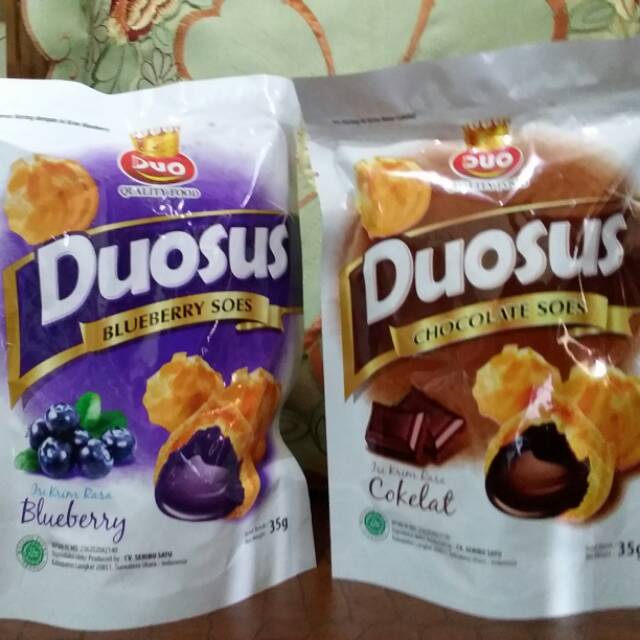 

Duosus Joy Rich Kue Soes Kering Cokelat / Blueberry Duo Sus Joy-Rich Enak Cemilan Murah Hampers Lebaran Bingkisan