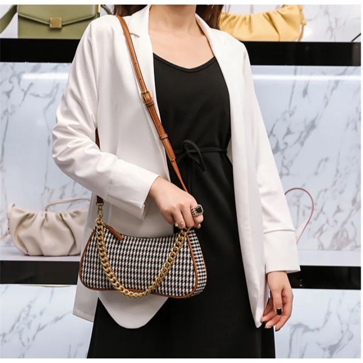 Naurra tas selempang dan bahu wanita koran style